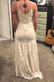 I ordered this one and the awaken my love white long sleeve lace maxi dress so I would have choices. I'm trying to spend the least amount as possible for my wedding. Anyways, this dress is perfect for showing of your shape. I'm not used to showing off my shape and my shape isn't where I'm happy with it yet so I'm probably going to return it. I love the train and the lace on it though! It's very comfortable and stretchy for a tight fitted dress. It was a tad too short for my height. Makes me wonder if getting a medium would have fit better. I would still recommend this dress, it just wasn't for me. - Kali F.