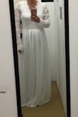 Ordered this dress to wear for an upcoming beach elopement but sadly, it just wasn't the right fit in either a small or a medium. I have an athletic build and tend to be between a 6/8 or S/M, but either way this dress just didn't work on my body. Because of how short I am, I knew I'd have to get it hemmed either way which is not a problem. The medium was loose and gappy in the back, sleeves too loose and long, but fit well in the waist. The small was a bit tight in the waist, didn't sit right on my shoulders and my back seemed to be pulling the opening apart TOO much. Sleeves were again too long for me in the small. (First photo is the small, second photo is the medium). - Bethany H.
