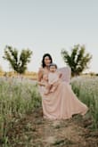 I wore this dress for mommy and me photos and was so in love. It photographed beautifully and was the perfect feminine, whimsical dress.
Note, the dress is nice and long so you can hem or wear with heels for the perfect fit. - Amanda D.