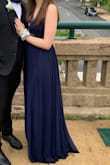 When I first got the dress I tried it on and it was perfect! The only thing I would change would be the length. I ordered a size medium and I am 5'7. The dress had a probably 2 inches of extra fabric at the bottom but that's not anything some heels couldn't fix! I loved it and got so many compliments and felt great in it all night! Really comfortable too. (: - Kaiya C.