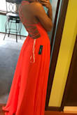 Dress fits great, straps on the back were a little hard to manage but once everything is on I felt very confident! - Nidia B.