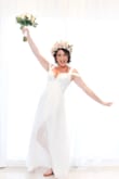 I fell in love with this dress and bought it for my destination wedding in Punta Cana. It was absolutely perfect. It fit me nicely I just had to have it shortened a bit and the straps shortened as well to keep the girls in place. I felt so beautiful in this dress and got tons of compliments! And what a great deal for a wedding dress! Most other dresses I looked at cost more than 10 times what this one does! - Emily L.