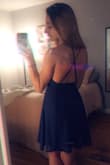 This dress fit me perfectly. I wore it to a wedding. It hit me at mid thigh and the adjustable straps in the back are a huge plus! Wrinkles easily when you are sitting down but hardly visible with how flowy the dress was. Flattering fit. Would recommend. - Breonna L.