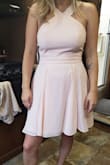 Fit my like a glove, seems to work great for shorter girls. Cute color, more pale pink than peach. A little wrinkly in the photo but is expected after shipping. Higher quality fabric. Absolutely love it! - Greta N.