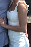 This was really cute! It made me feel a little self conscious about my stomach (typical girl thing I know I'm not fat) but overall was a nice fit and made me feel cute. I had a lot of compliments in the dress as well. I LOVED the ruffles and the length of the dress. I'm 5'8 and normally dresses run short on me (this one did not). Perfect dress for any occasion, it can be dressed up or down! The material was very stretchy and overall fit great. If you have a nice booty this is the dress for you. - Kellie W.