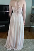 Absolutely love it. Perfect for prom, the back is beautiful and it's the perfect color. Feels very well made. - Madison M.