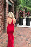 This dress won't let you down. I wore it to a gala and I got so many compliments. I felt like a celebrity it fit like a glove and was very comfortable. I ordered an XS and got it hemmed to fit my height. - Brittany B.