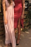 I wore this dress for a wedding this past weekend and loved it. I ordered a size small and had to get the straps taken in a bit and took off about 1 inch since I was wearing flat sandals. It fit perfectly after the alterations were done. Good quality. Would buy again! - Angela W.