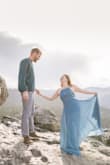 I got this dress specifically for my engagement photos and it definitely did its job. I have extremely broad shoulders but short legs, so while I normally would wear a medium top, I ordered a small because I didn't want the length to be too long. The dress was still a little long in length for a 5' 1'' person, and tight around my shoulders, but that's true for most clothes I wear. It zippered with no issues and it has nice elastic by the zippers for that little extra room you may need, which I liked. I also have no chest, so the cups were a little large, but if I adjusted the straps it remedied the problem as it moved the neck line up. It was beautiful and great quality. Even though the fit wasn't perfect for me, I feel like it would be perfect for most who wear a small. - Katie L.