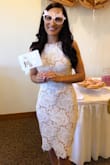 The look and fit of this dress is so incredibly flattering. I truly felt like a bride at my bridal shower!! This dress is amazing quality, the perfect color, and the prettiest pattern. I wanted something different than just a white lace dress, and this is exactly what I had in mind! It covers in all the right places which made me feel modest, but it's still sexy. I got soooo many compliments on this dress at my bridal shower! Thank you Lulus! - Desiree T.