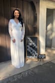 I originally bought a medium but I had to return it because it fit too small. I had to return it and buy a bigger size and it fit very well. I really wanted to wear this dress for my bridal shower. My family and friends loved it. I really love this dress. - Yenizeth N.
