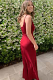 This dress was so comfortable and flattering! I was comfortable all night but felt beautiful in this dress. A strapless bra is all you need and it covers well in the front. The straps are adjustable. I loved the color too! - Sheri R.