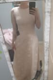 I am so excited about this dress. I bought it as a "tester" to see if I could trust buying product on this website. When it came in (earlier than expected, too), I tried it on and found it fit perfectly. The waist is snug which I normally hate, but this looks gorgeous. The bottom flows so nicely and I absolutely love the material. It is heavy and not thin and flimsy at all. I am short so I will have to hem it, but that is to be expected. The colour is a bit lighter than the photo, almost a blush-white depending on lighting. I have chosen this dress to get married in next year. - Kenzie P.