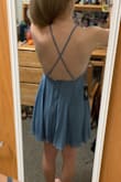 I wore this dress for my graduation, and it worked perfectly! The straps in the back are adjustable which helped it fit just the way I needed it to. It is a great length and would work for many different occasions. - Kaitlin W.