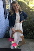 I wore this dress for my bridal shower. I loved it and I got so many compliments! I did have to get it hemmed because it was like 6 inches too long for me. I had on a jean jacket for part of the day and it still looked so cute! - Katie B.