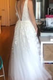 This was a pretty dress but it was too big and it just wasn't my style. If I were to wear it, I should have gotten an XS (the waist and top were too big and it made the dress look baggy). In general though I wasn't especially keen on it because the embroidery and white tulle looked a bit too shiny. I usually LOVE dresses from Lulus, but this was just a so-so. No problem, though...I wound up buying another dress from Lulus as my wedding dress! - Sarah R.