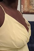The dress is a beautiful color and perfect length. I usually have to order larges because I have a larger bust and hip area but the bust area is so awkwardly designed in this dress. It is extremely loose and hangs off you. This dress does not sit on you like it does the model. Had to return! - Kenya M.