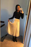 I had this skirt on my wishlist forever, I got an email that it was back in stock & ordered it ASAP. I'm so glad I did because I absolutely love it! I usually wear it with a black body suit & black heel boots, super chic boho vibes. It fits true to size, I got an XS as I usually do with Lulus. - Savannah S.