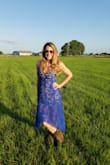 I wore this gorgeous dress to a country wedding! Such a gorgeous dress! I purchased a medium and it fit me like a glove. I wore it with cowboy boots and it looked amazing! This dress can be dressed up or dressed down. I am so glad I purchased this dress! I would highly recommend it. It is extremely classy and it hugs your figure at the right places. - Lisa G.