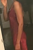 It's a charming little dress. It has a soft slinky feel. I'll definitely be wearing seamless underwear with this one. I'll probably belt the waist as it's loose there while I'm moving around. Otherwise, fun and inexpensive little dress for summer. - Michaela W.