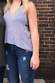 I was a little wary buying this shirt since I've never worn anything like it before. However, it fit amazingly. I wear a navy bralette underneath and receive so many compliments when I wear it. Very casual and cute and perfect for summer! Adore it. - Melissa S.