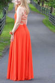 The dress was so pretty and fit very well. True to size. The color was a deep orange and just beautiful. - Chris F.