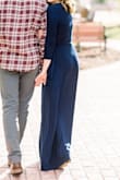 I got this for my engagement photos, and it was amazing. Since it's a wrap dress, it's easy to make it fit your body. The material is kind of that thin, stretchy type, so you definitely want seamless underwear! - Haley H.