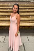 I wore this dress for my prom and I loved it so much!  It's very elegant and I got so many compliments on this dress. My only issue with it was that since I'm only 5'2 it was very long even with heels. I ended up having to get it tailored ($64 at Nordstroms which took about 4 days), so if you're short like me you'll likely have the same problem. With that said, I would 100% buy this dress again. The quality was amazing and I was really happy with how I looked. If you're shopping for a special event, I highly recommend! - Cassidy C.