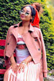 What i love about this coat is the style and color, it is a cropped trench but so cute and stylish, i have been wearing this jacket since i bought it, it absolutely goes with everything and the color gives it just enough classic look. The material is suede and soft but my one complaint is that it has no linings, so inside looks rather rough other than that this is my favorite crop jacket and will be wearing it with everything ! - Donia M.