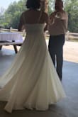 I don't normally write reviews but I used these reviews when I purchased this dress so I decided to review to help future shoppers. This dress is amazing! Hides flaws, flowy and beautiful! So many compliments on my wedding day. - Joye M.