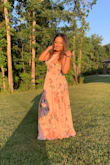 I'm usually a L but i ordered this dress in XL to make sure it would fit me from the bust area which it did. Now the down size of being short it's that the dress was way too long so I had my dressmaker cut it from the bottom. - Yvette P.