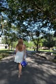 Wore this dress for my college graduation and I absolutely loved it. It was super comfy and looked great! It was a bit loose around the waist for me, but it worked out just fine. The open back is beautiful and the dress looked very elegant. - Raelynn V.
