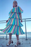 Do not be intimidated by the colors or the loose ruffles!! I got this dress for a wedding in Florida and it was a hit! I got so many compliments. On top of that, I loved it, it fit great and was super comfortable! I am typically a size 6-8/M in dresses. 10/10 would recommend. - Valeri W.