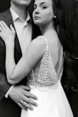 I had it hemmed and the straps taken up for my engagement photos. It turned out great! The waist is a bit loose but not noticeable due to the flowy nature of the dress. I could have sized down, but the size 4 had more breathing room and with straps altered it was fine! - Sam D.