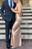 I bought this dress for a wedding. It is so stunning. It hugs your curves and shines so beautifully in the light. It does not itch under your arms and is so breathable!!! The material underneath is so soft and comfy. Dress is light and easy to walk in. I also got sooo many compliments. I can go on and on. - Diana O.