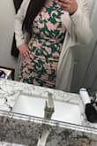 This dress hugs me in all the right places. The only thing I would change is the slit in the back of the dress, it's a little high and showed my spanx so I had to wear a long coat with it! Other than that, beautiful dress! - Jazmin Z.