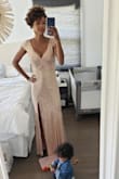 The product photo does not do this dress any justice. It's so much nicer in person. I order it for a formal birthday party. It fit perfectly, no adjustments are needed. I'm wearing it with a 3" Heel. I'm amazed by the price, I would have expected it to be much more for the quality. - Sheena A.