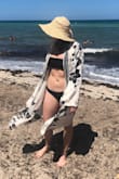 This is the best cover up ever! I love the material it is so soft. It is actually "Billabong brand" and I love it. I ordered a small but probably could of gotten an XS as the sleeves were long....  I wore it to the beach and around the house! Would recommend. :) - Rachael A.