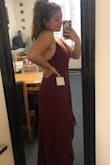 I loved this dress! It was incredible flattering and made me look very classy. The large fit me perfectly; however, it was a little long even with heels. I would have to get it hemmed. It doesn't give you many curves, but that could just be because I have no waist haha. - Marie D.