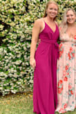 I LOVE this jumpsuit. I got so many compliments on it and it was so flattering and comfy. I purchased a medium which was perfect but it JUST fit my torso. I have a very long torso so that's why, so if you're any taller than me and have a long torso, consider ordering a large. The straps are stretchy though which helps! - Ashley M.