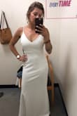 Ordered this dress for a black tie, black and white themed wedding. Because the fabric is stretchy, it certainly hugged my body...but the chest was just a little big and the straps seemed slightly long(even though they're adjustable, the little plastic piece that adjusts was almost on top of my shoulders. Like maybe I should have ordered both the size small and an XS to compare? It was also long...and of course I'd waited too late to get it hemmed:/ My fault!
But the quality was great and the dress was beautiful. I received lots of compliments! - Sara G.