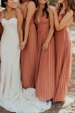 I ordered this dress for all of my bridesmaids, who range from 5'11" to 5'2". This was the perfect dress for all skin tones and hair colors and body types- I am extremely happy with this dress. It was twirly and gorgeous and photographed amazingly. 10/10 recommend! - Hailey L.