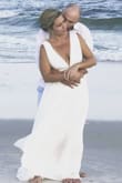 This dress is beautiful! It fit perfect and was exactly what I wanted for my beach wedding. It flowed beautifully in the wind, and I got tons of compliments on it. I'm so happy I chose this dress. You won't be disappointed! - Amanda C.