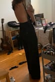 I love this jumpsuit and can't wait to wear it to my cousin's wedding in a couple weeks! I ordered this about two weeks ago in a size small, and although it's stretchy, it fit a little too snug for my liking around my waist/back. I decided to exchange it for a medium, and it's much more comfortable without compromising the style/fit. Lulus customer service is superb, and I was able to get the correct size with my original discount from my initial order! Heels are a must with this jumpsuit otherwise it will drag on the floor, but I believe it's meant for heels/wedges. The straps are comfortable and adjustable. I plan on wearing an adhesive bra as it is a backless jumpsuit. Don't pass on this one. It's a staple for anyone's closet! - Marissa A.