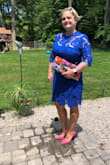 I absolutely love this dress. I needed something for a wedding that would stand out and be sophisticated enough. I usually am a solid Large (157lbs) and the XL fit perfectly. I'm large chested (40D) and as reviews mentioned it fit me perfectly and my arms have plenty of give for dancing. - Melanie H.