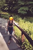 I love this top! I have it in the coral orange, and olive green. I plan on purchasing more colors because I love it so much! I've been wearing it without a bra, it's thick enough. If you're thinking about purchasing it, just do it. You won't be disappointed! My normal size fit me perfectly. :) - Ashley T.