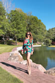 I'm in love with this romper. It fits me perfectly! Even though it comes with long sleeves, you won't feel hot at all because of the the material is light. I also love the color. I wore it to graduation party and got so many compliments. I'm so happy and will definitely recommend purchase this romper. You will not regret it! - Kayla S.