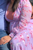 Beautiful dress. Received many compliments. I put a tank top underneath to not show my boobs. Very long. Bought a medium and it fit me perfectly. - Elisabeth P.