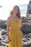 Ordered the yellow because I didn't want to wear white to a wedding. The fit was great minus the length. The flowiness was perfect for a beach wedding. - Laura I.