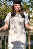 I bought this for my graduation and absolutely loved it! The cut is super flattering, and I got so many compliments on it. - Olivia A.